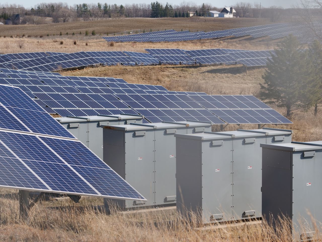 The Art of Drawing Readers In: Your attractive post title goes here Expansive solar panel field in a rural area harnessing solar energy. Sustainable and renewable energy source.